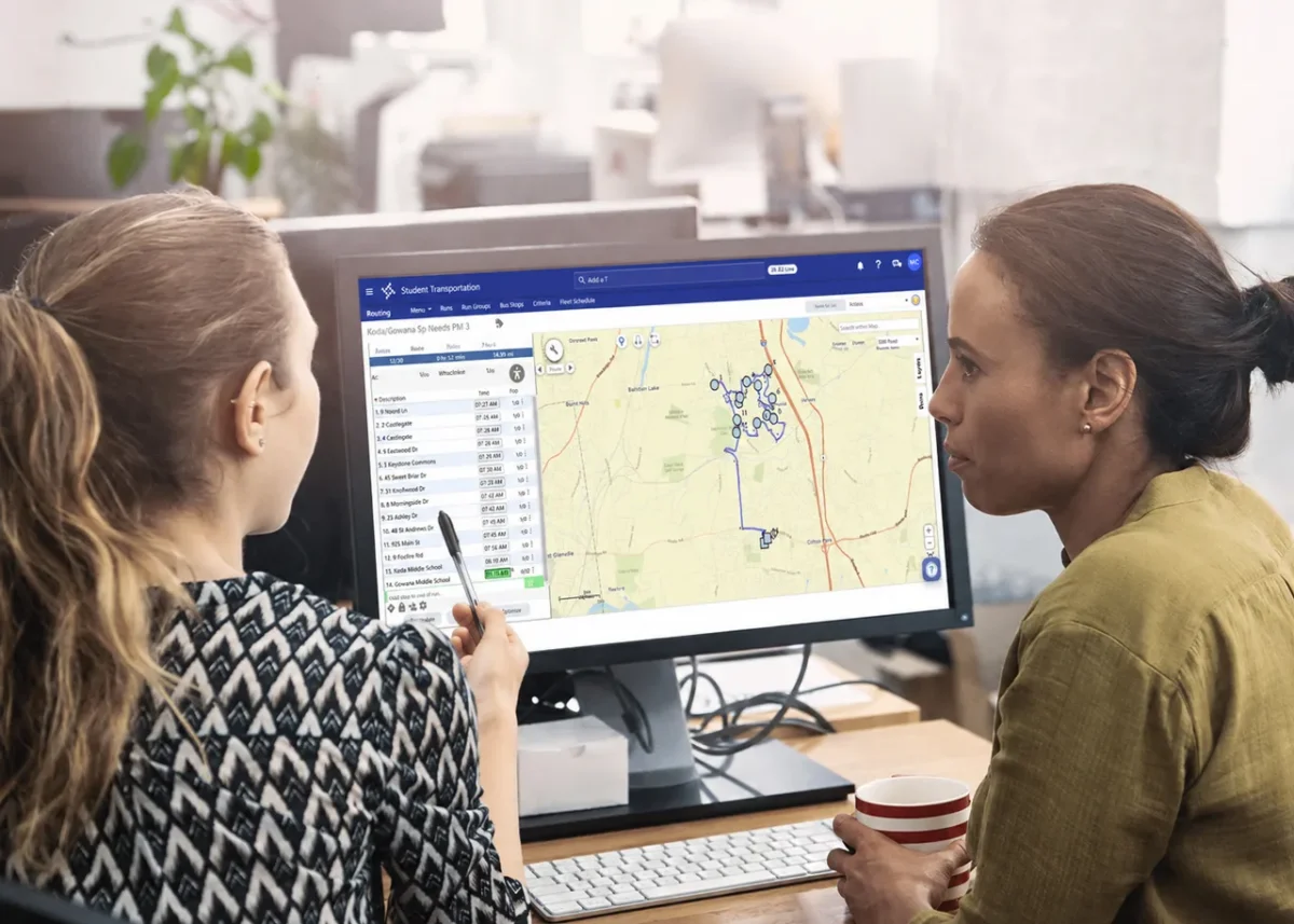 2 women looking at Routing Map